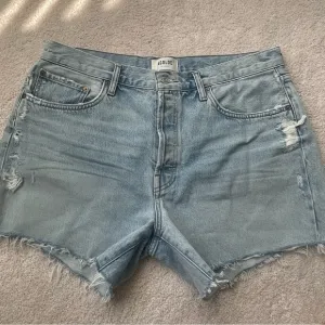 Agolde light wash jean shorts