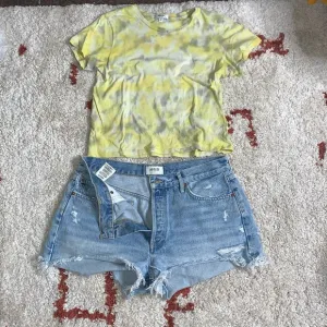 Agolde- Size 31-Light wash cutoff shorts- Button Fly- High rise