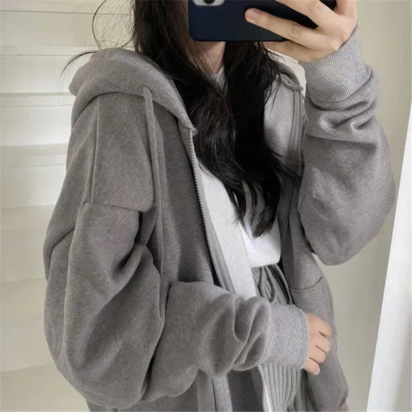 Long, loose baseball jacket with oversized pocket, hood, and zipper.