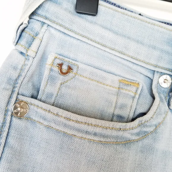 TRUE RELIGION Cora Mid Rise light wash cut off jean shorts raw hem Size 25